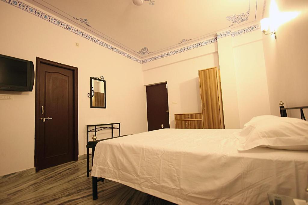 Hotel Devi Palace Удайпур Стая снимка